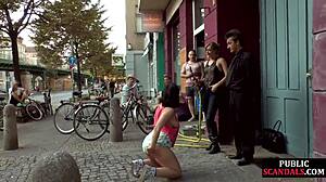 Busty German girl degraded and submissive in public